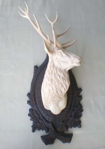 Deer head - carved